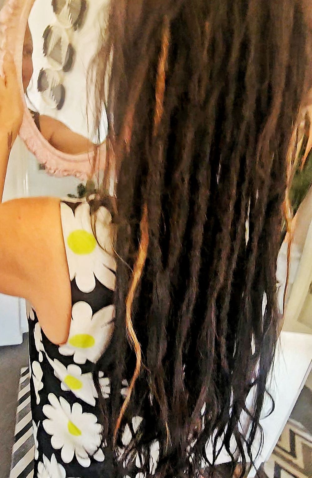 Permanent dreadlock extensions for very fine hair creating refined length and fullness