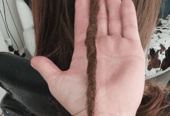 Permanent human hair dreadlock extensions maintained for long-term wear