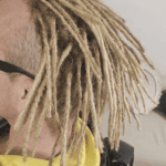 Permanent human hair dreadlock extensions showing a finished full-head result in the UK