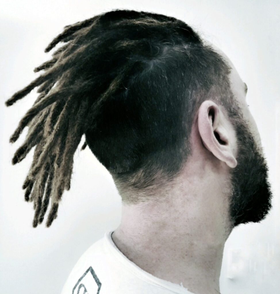Side view of permanent human hair dreadlock extensions